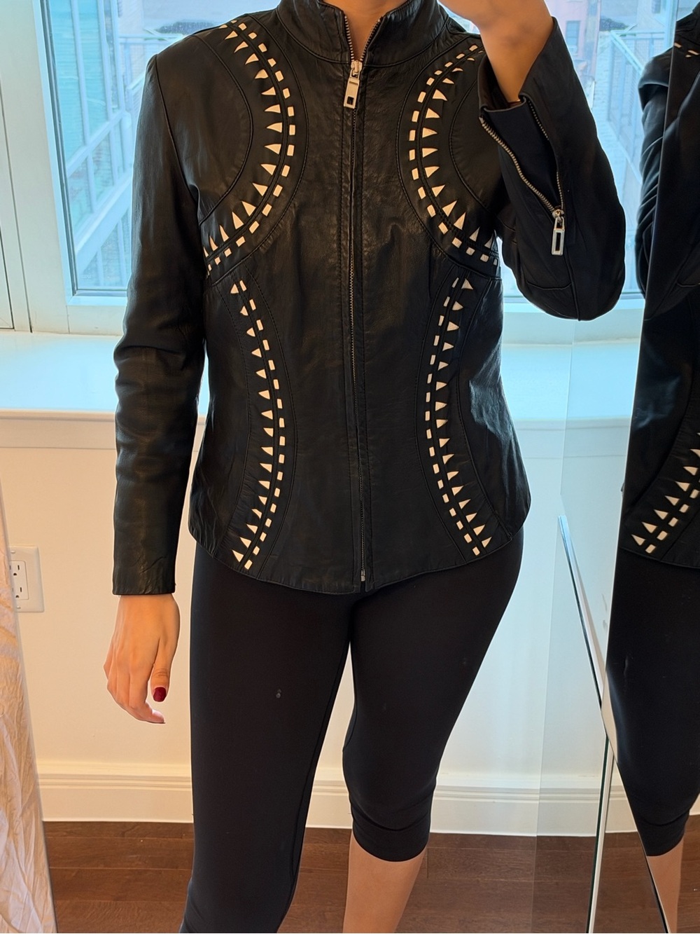 Vintage Women's Black Leather Jacket with Cutout Detail